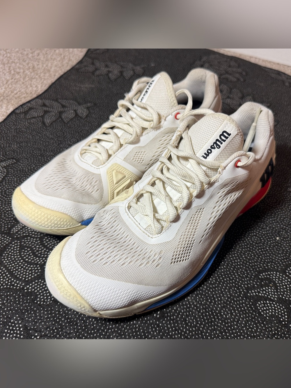 Wilson White Athletic Tennis Shoes with Blue and Red Accents